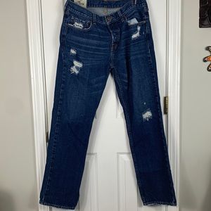 Hollister California distressed blue jeans size 32x 30. Dark wash